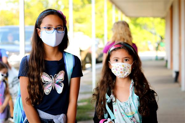 students smile on first day of school
